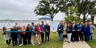 Members of Alzheimer’s Foundation of America, Port Washington Water Pollution Control District and Town of North Hempstead officials gathered to open a new park in Port Washington dedicated to families suffering from Alzheimer’s.