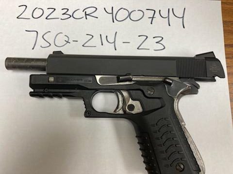A loaded gun was recovered from Denton's car.