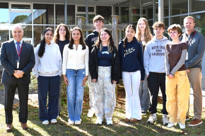 North Shore High School principal Eric Contreras and Director of Counseling Daniel Doherty with the commended students.