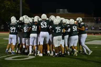 The Carle Place football team played Lawrence at the high school's homecoming game, capping off a week of spirit.