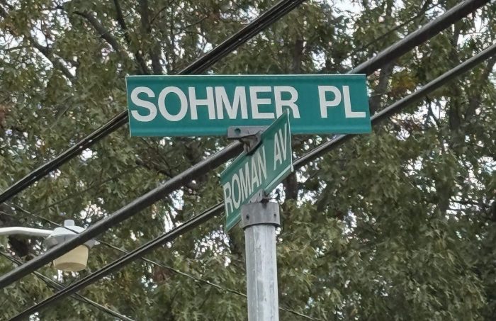 Nassau County Police are looking for a suspect after a suspicious car fire in New Cassel.