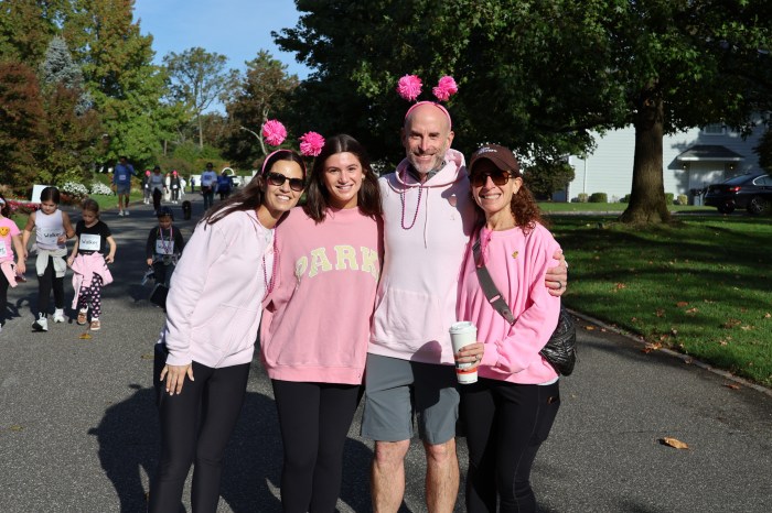 Families gathered in pink to raise awareness for breast cancer.