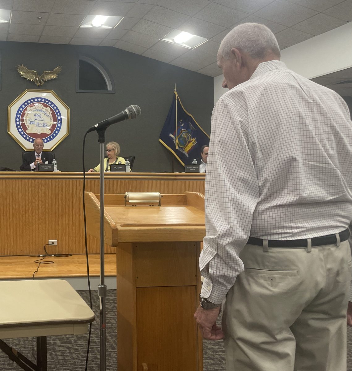 A resident seeks clafication of the local law adopted by the Village of North Hills that requires residents to maintain private roads, despite resident concerns.