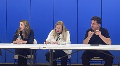 From (L.) to (R.) Superintendent Allison Brown, board of education president Meryl Waxman Ben-Levy and vice president Michael Levine during the special district meeting to approve vote totals for the purchase of the school's transportation property.