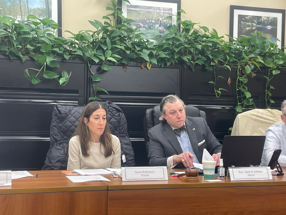 Roslyn Estates Trustee Susan Rubinstein (L.) and Mayor Adam Koblenz during the October board of trustees meeting.