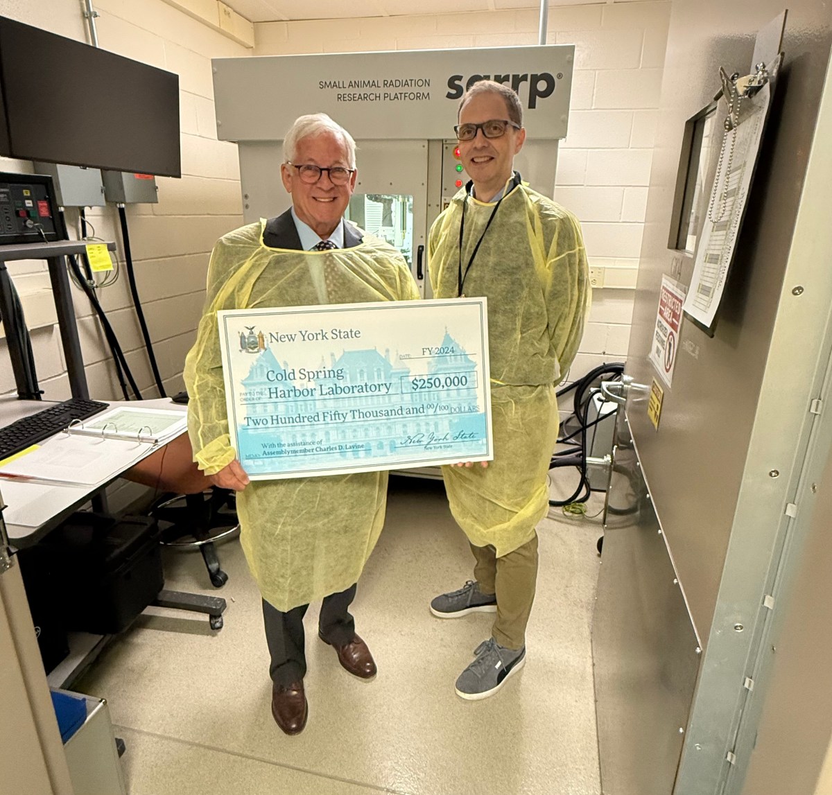 State Assembly Member Charles Lavine (L.) and Scott Lyons (R.) at Cold Spring Harbor Laboratory's Genome Research Center in Woodbury.