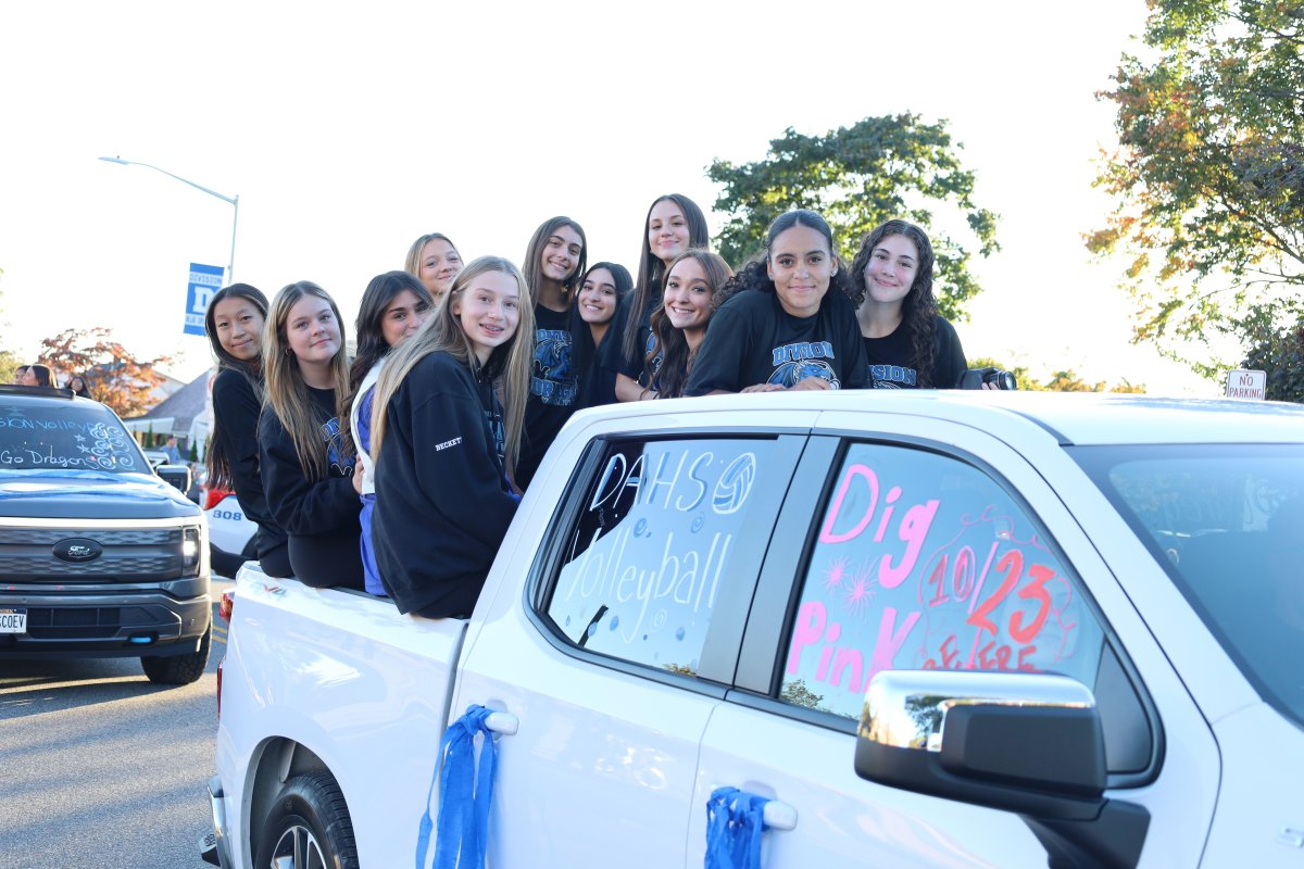 Members of the Division Avenue High School volleyball team joined the annual homecoming parade.