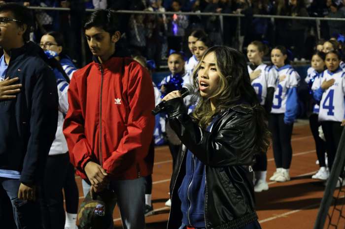 Denisse Chin sang the national anthem.