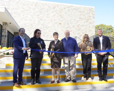 Superintendent Bradley Porche, principal Michelle O’Brien, Trustee Catherine Yeadon, Trustee William Charon, board chair Joyce Bisso, COO Tim Charon (L. to R.) cut the ribbon on the newly renovated Mill Neck Manor School for the Deaf.