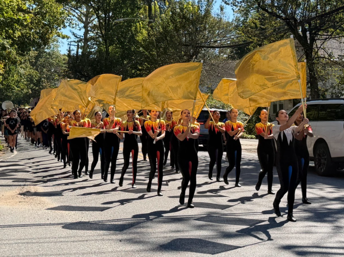 The parade marched down Main Street with dances and music by Roslyn students.