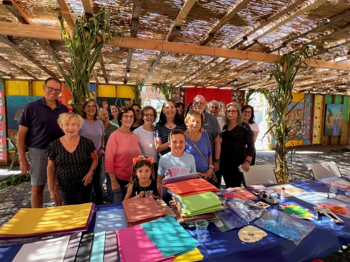 Shelter Rock Jewish Center at work decorating its Succah in advance of the festival of Succoth with a meal for up to 200 persons.