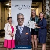 Town of North Hempstead Clerk, Ragini Srivastava (L.), Tom James Partner Heidi Goldstein (C.) and Town of North Hempstead Supervisor Jennifer DeSena at the ribbon cutting for Tom James Company in Roslyn Heights.