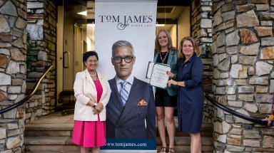 Town of North Hempstead Clerk, Ragini Srivastava (L.), Tom James Partner Heidi Goldstein (C.) and Town of North Hempstead Supervisor Jennifer DeSena at the ribbon cutting for Tom James Company in Roslyn Heights.