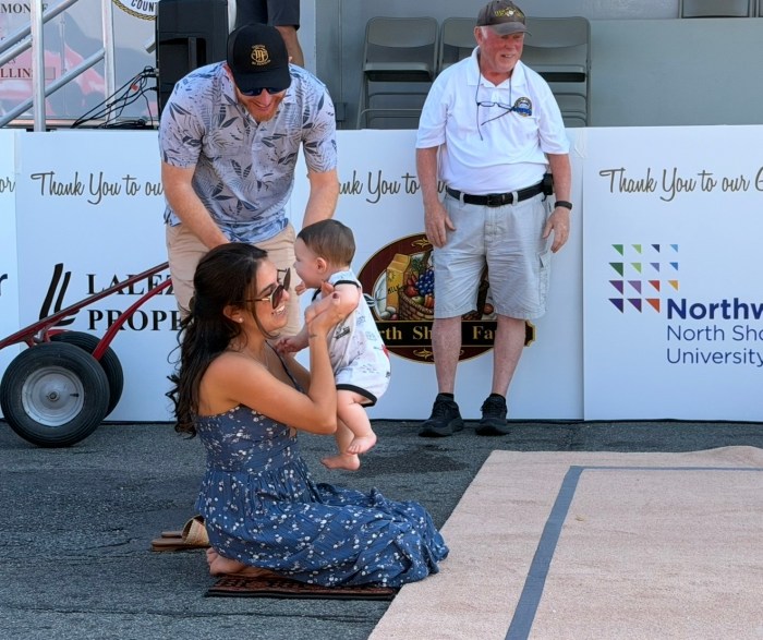 Seven month-old Noah Dunn won a baby-crawling contest at the street fair.