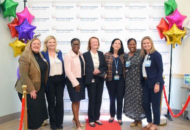 Glen Cove Hospital administration, including Theresa Dillman (Far R.), Kerri Scanlon (Third from L.), and Tameka Wallace (Second from L.) celebrate the facility's recognition from the American Nurses Credentialing Center.