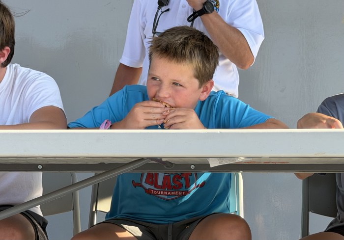 The street fair offered several competitions, including a taco eating contest.