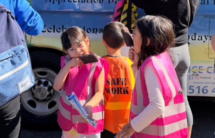 Families cooled off with ice cream and other frozen treats at the Touch-a-Truck event.