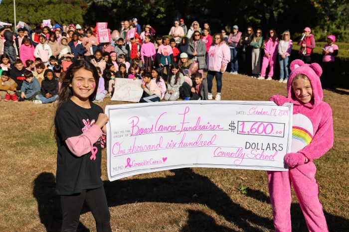 Connolly students pose with a check for $1,600, the total amount fundraised at last year's event.