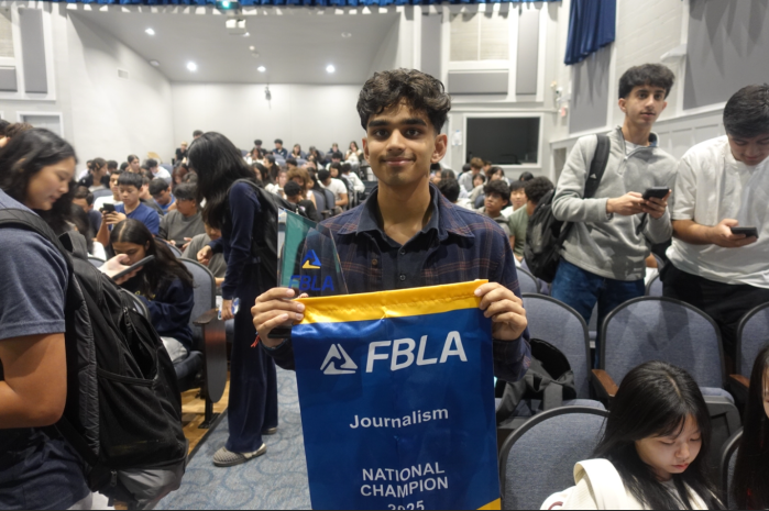 Jericho High School senior Dev Lakhani with his first place National Future Business Leaders of America Journalism award, Jericho High School.