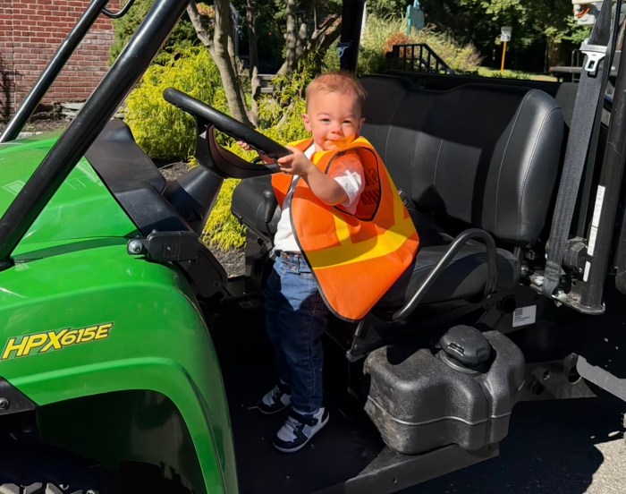 Kids posed for adorable photos at the Touch-a-Truck event.