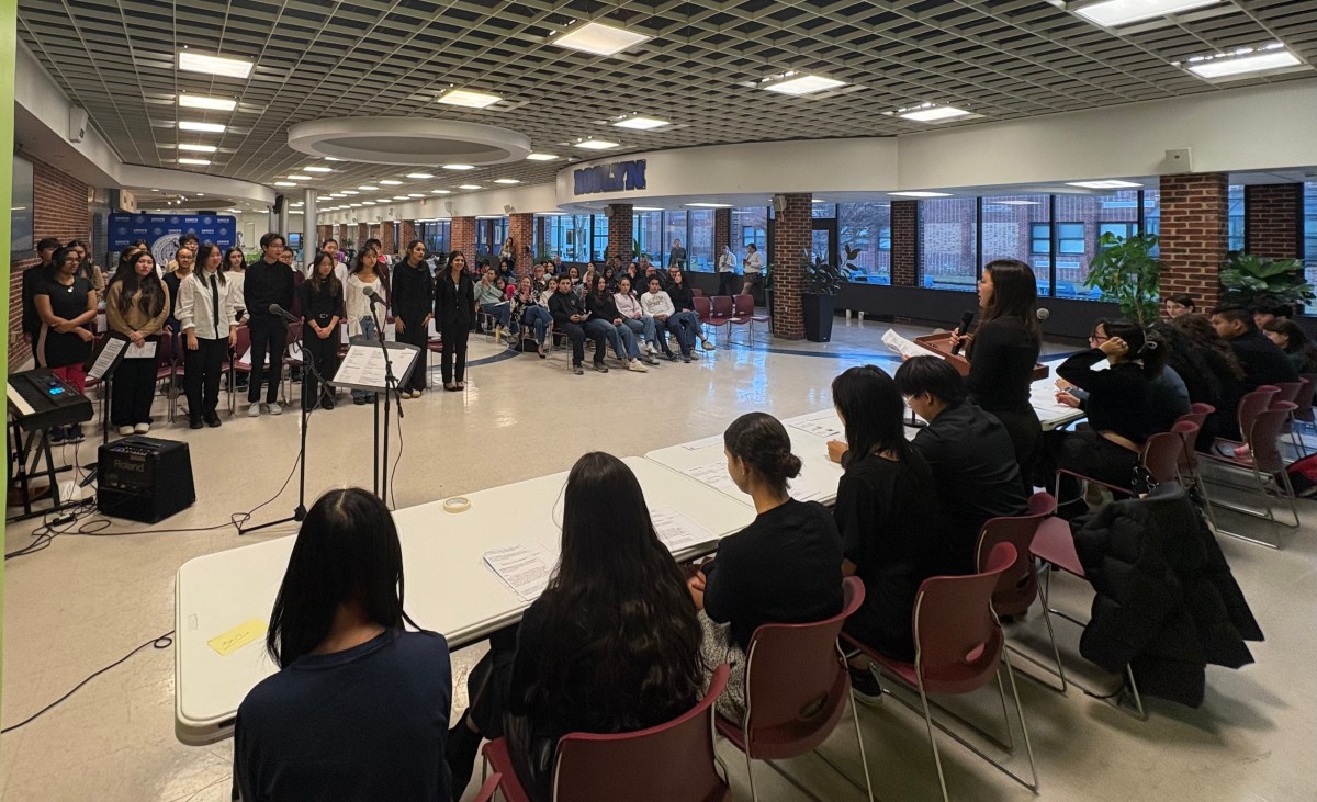 The Tri-M and ITS induction ceremony at Roslyn High School.