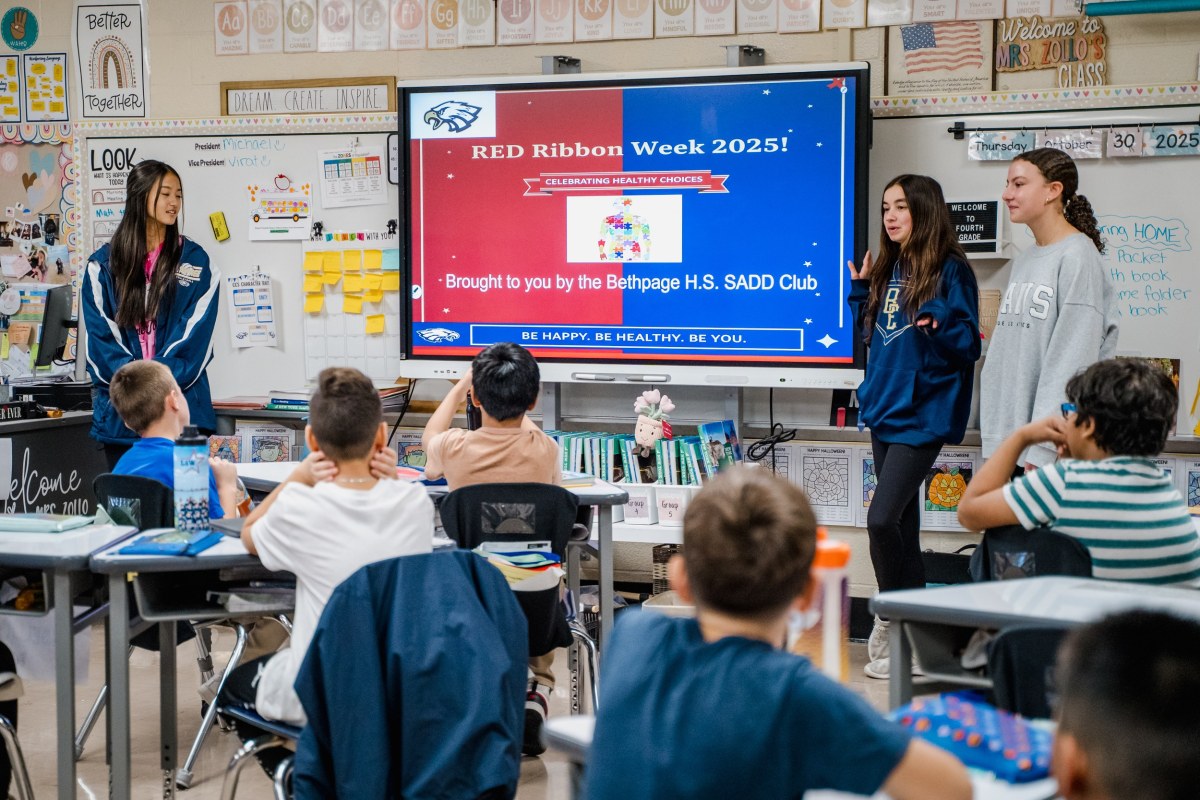 Members of Bethpage High School’s SADD chapter lead a lesson about healthy choices at Charles Champagne Elementary School.