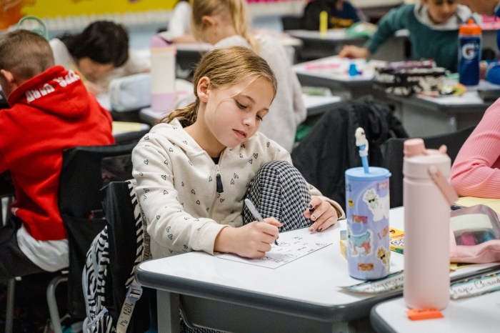 The presentation sparked a thoughtful hands-on activity where students decorated puzzle pieces.