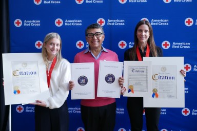 (L.) to (R.) Charlie Dubofsky, Jose Dominguez and Jamie Hassenbein at the Long Island Heroes Celebration.