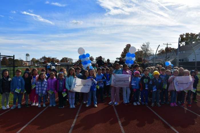 A group photo of Cherry Lane students, teachers, administrators and parents.