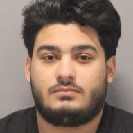 David Beckham Adam was charged with one count of grand larceny and faces possible deportation, according to Nassau County Police.