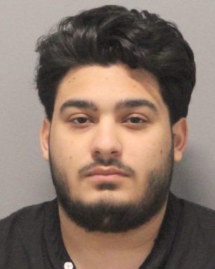 David Beckham Adam was charged with one count of grand larceny and faces possible deportation, according to Nassau County Police.