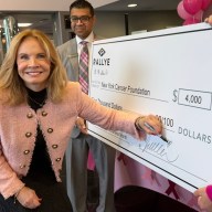 CEO of Rallye Motor Company Juliana Terian signed a check to New York Cancer Foundation for $4,000.