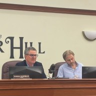 Village of Flower Hill Mayor, Randall Rosenbaum, and Deputy Mayor, Frank Genese, at their June board of trustees meeting.