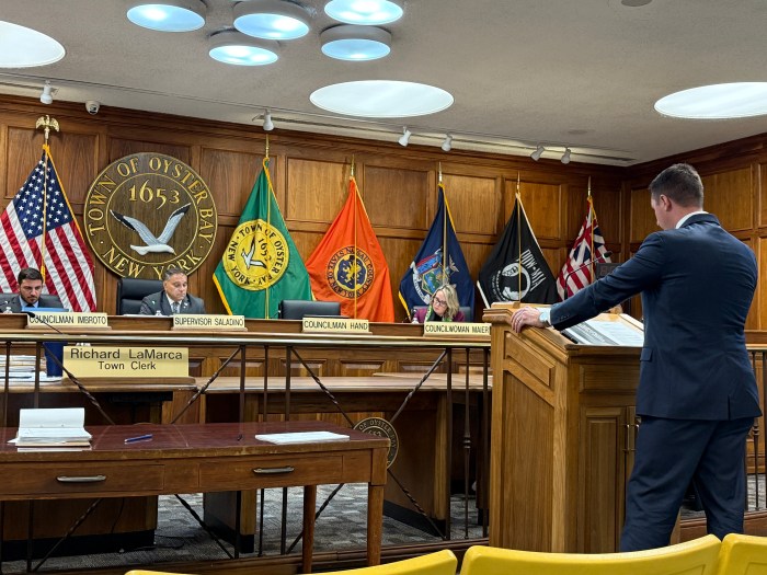 Erik Snipas represented the three businesses during the public hearing in front of the Oyster Bay Town Board.