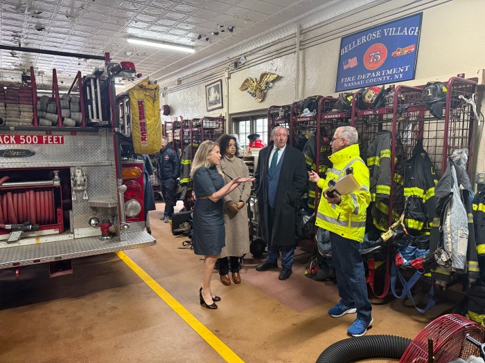 U.S. Rep. Laura Gillen (L.) and state Assembly Member Michaelle Solages (second from L.) received a tour of the fire department from Bellerose Village Mayor Kenneth Moore (second from R.) and Bellerose Village Fire Department Chief Raul Sanchez (R.).