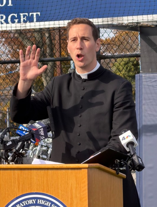 Rev. Stephen Rooney gave remarks at the ceremony.