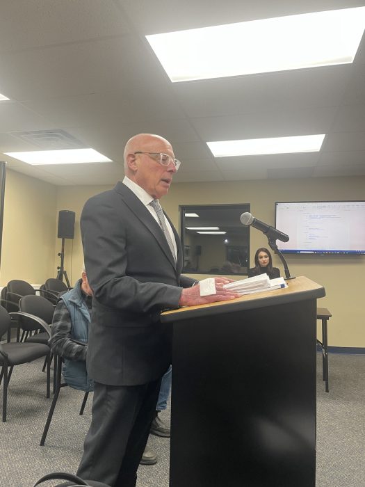 Attorney Micahel Sahn addressed the Port Washington North Board of Trustees with new findings on the smell emitted from Bombay Kitchen.
