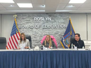 Roslyn School District Superintendent Allison Brown, board president Meryl Waxman Ben-Levy and vice president Michael Levine during the November board of education meeting.