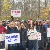 Great Neck residents gathered at Kings Point Park to protest a proposed private development that would turn parts of the park into a parking lot.