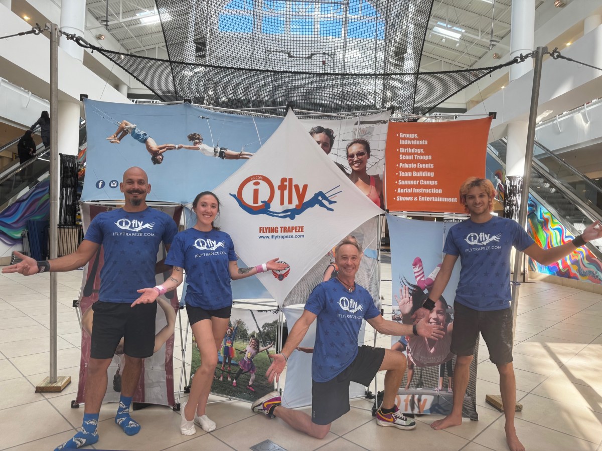I.FLY Instructors Miguel, Stella, co-owner Anthony Rosamilia, and Spatola (L. to R.) at the newly opened aerial arts school in Westbury.