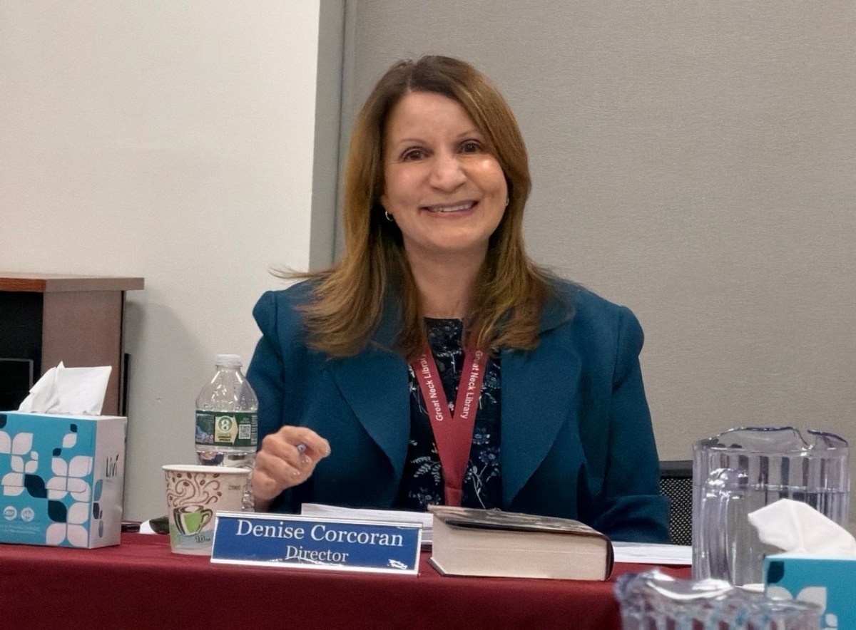 Great Neck Library Director Denise Corcoran heard the library's audit report.