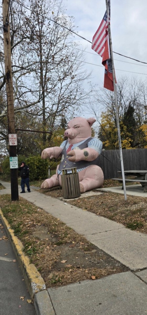 Village of Great Neck officials said union-affiliated protestors displayed an inflatable pig outside the village's trailers.