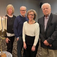 Sandy Pensak, Shelter Rock Jewish Center Holocaust Remembrance Committee Hazzan Larry Goller, Shelter Rock Jewish Center president Susan Pavane and speaker Arnold Newfield at the 87th anniversary of Kristallnacht.