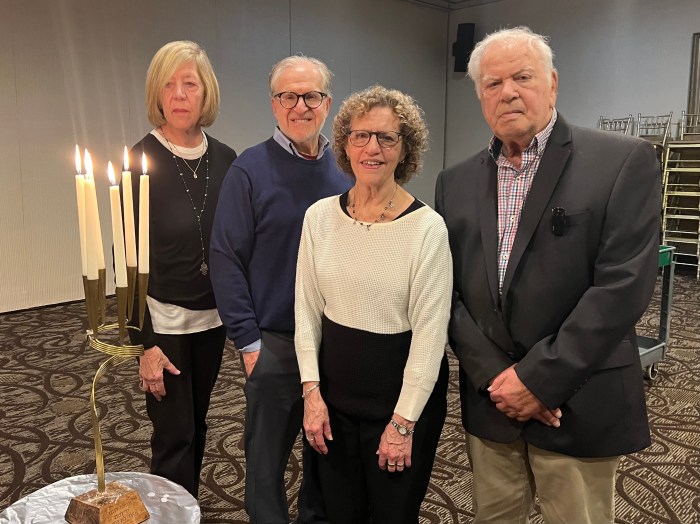 Sandy Pensak, Shelter Rock Jewish Center Holocaust Remembrance Committee Hazzan Larry Goller, Shelter Rock Jewish Center president Susan Pavane and speaker Arnold Newfield at the 87th anniversary of Kristallnacht.