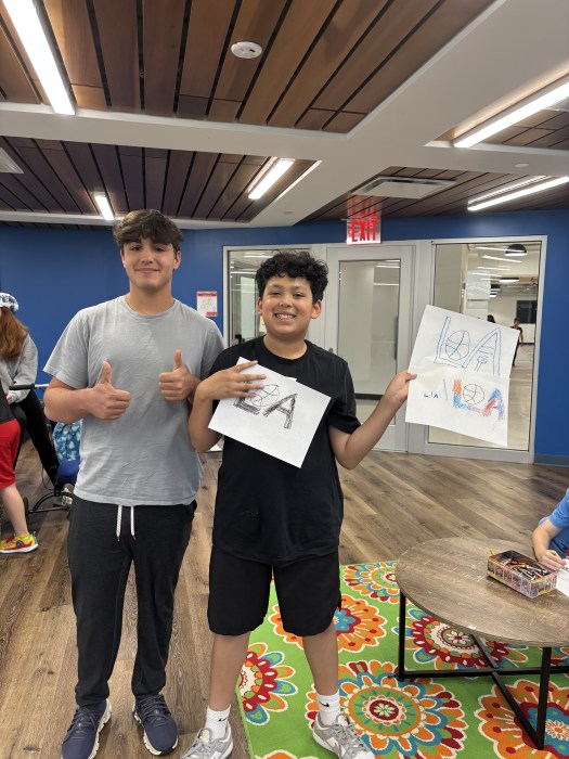 Goldman and a student.