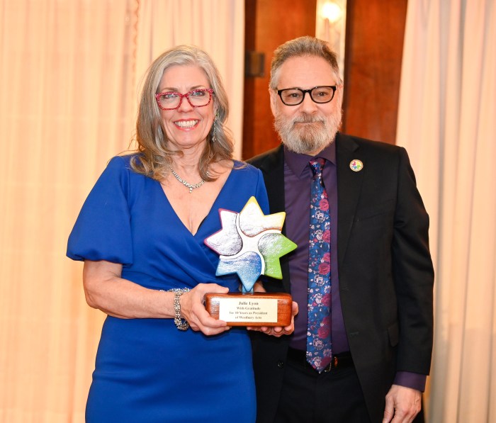 Westbury Arts President Julie Lyon was honored with a special dedication with her husbandTom Cabrera.