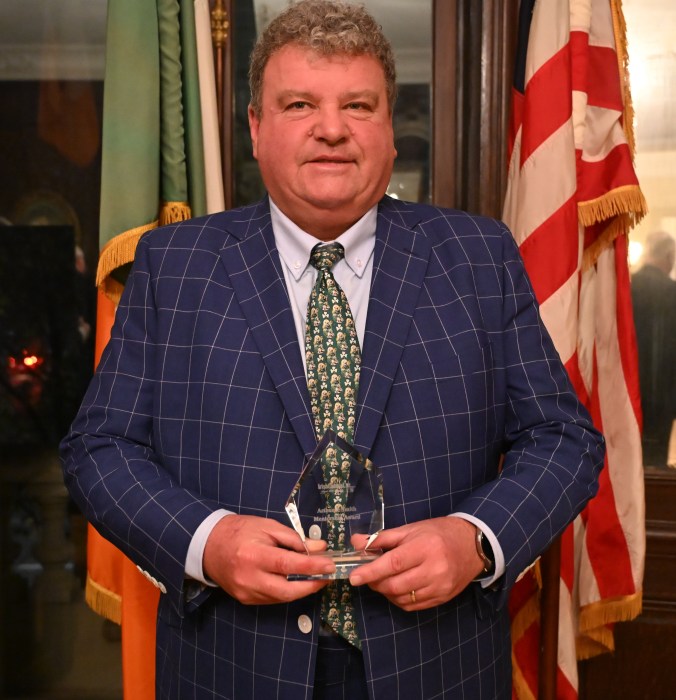 Arthur “A.J.” Smith with his IrishCentral Mentorship Award, recognizing his decades of leadership and guidance.