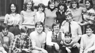 John Shorter (center, in vest and glasses) posed with students.