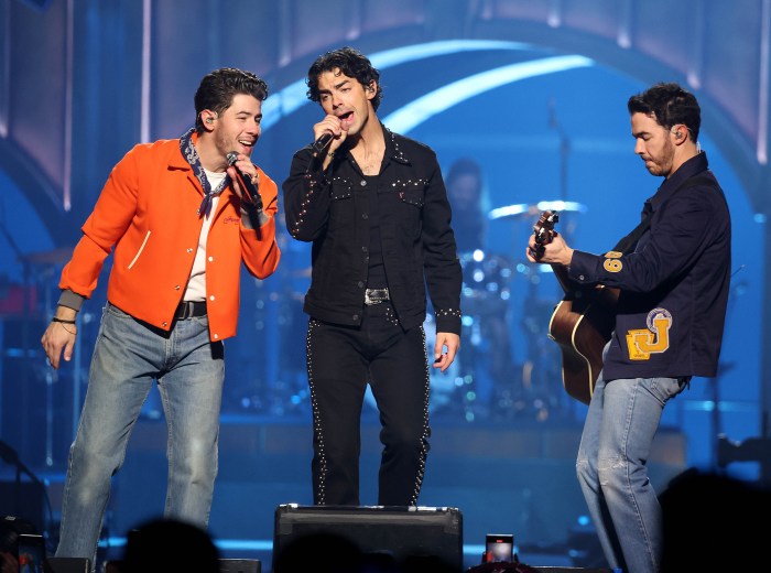 The Jonas Brothers perform during their concert at UBS Arena.