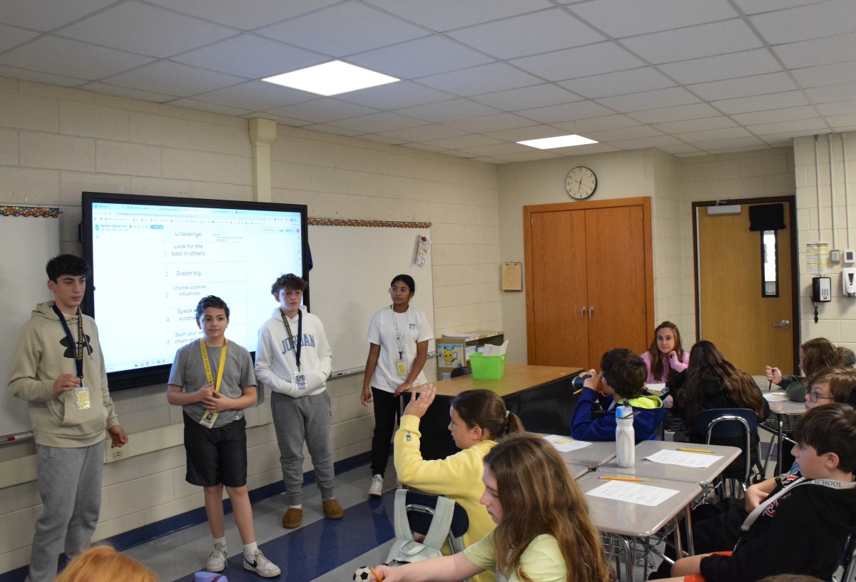 Berner Middle School student council leaders Jake Hillkewicz, Russell Tessler, Salvatore Benito and Naya Raghunath (L. to R.) spread messages of kindness to sixth graders in MS 101 classes based on last year’s Rachel’s Challenge assemblies.